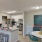 a kitchen with a table and chairs