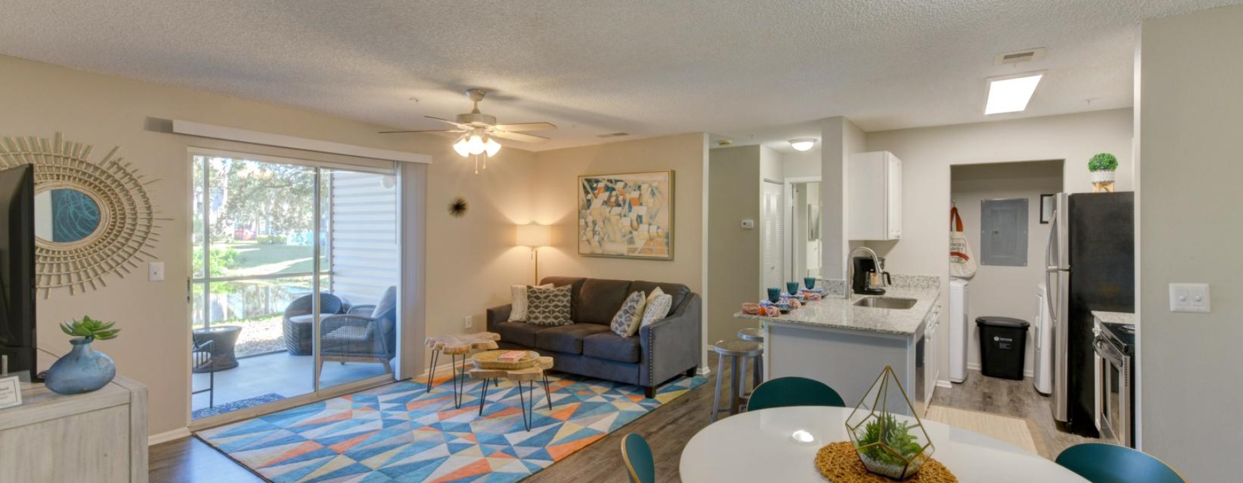 a living room with a dining table