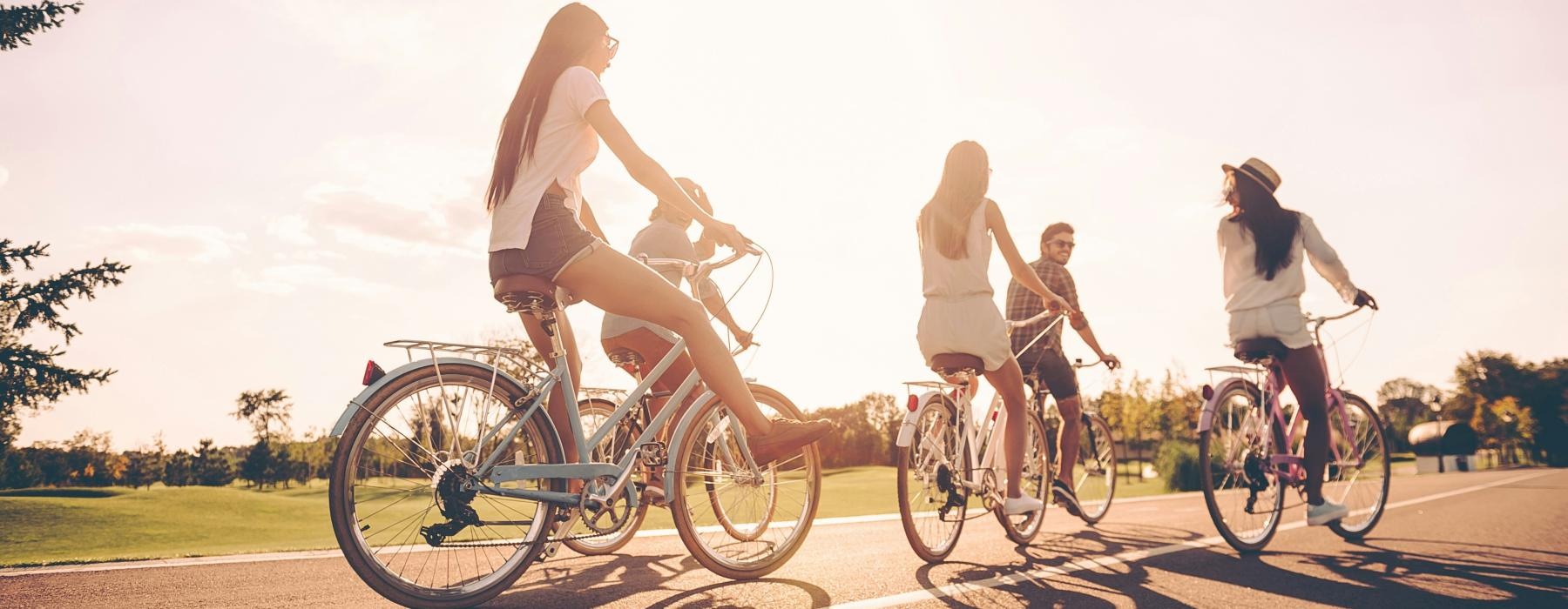 a group of people riding bikes
