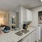 a kitchen with white cabinets