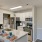 a kitchen with white cabinets