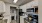 a kitchen with white cabinets