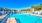 a swimming pool with a fence around it
