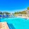 a swimming pool with a fence around it