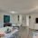 a kitchen with a tv and a table